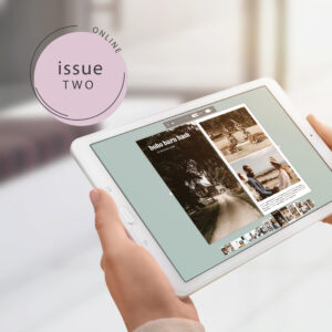 Women reading issue 2 of Isle Weddings magazine on her tablet